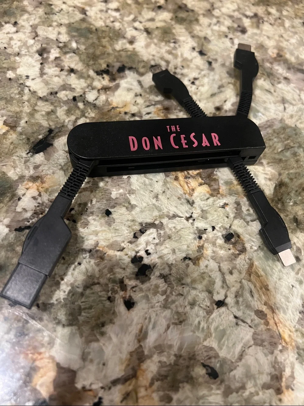 The Don Cesar 4-in-1 Charging Cable - Black with Pink Logo - Brand New!